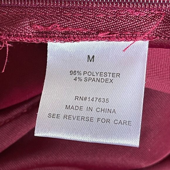 Red Sleeveless Jumpsuit Plunging V-Neckline Fitted Waist - Picture 7 of 9